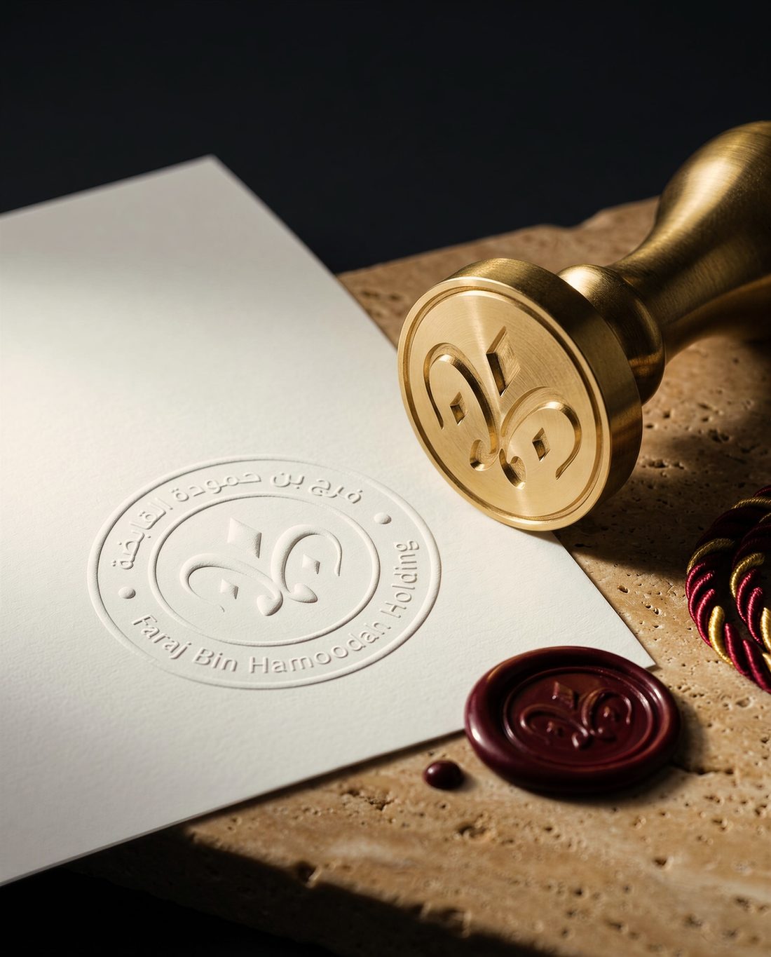 Wax seal and emboss on white stationery