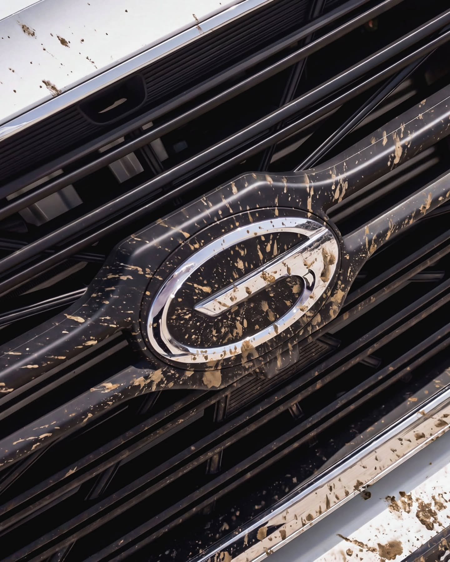 The GAC grille covered in mud after site work