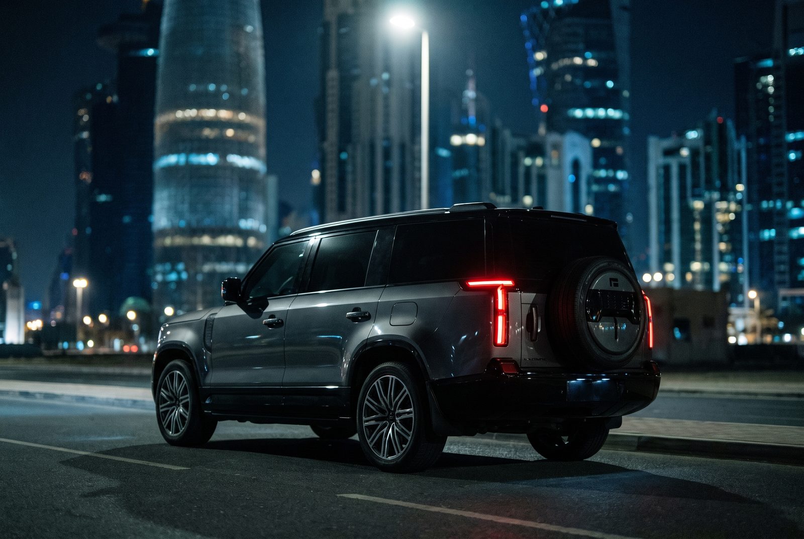 The ROX Adamas at night in West Bay, Doha